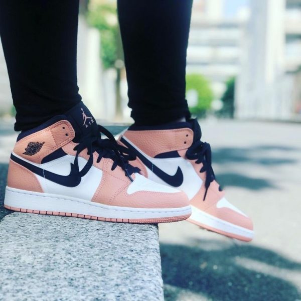 Peach and black sneakers